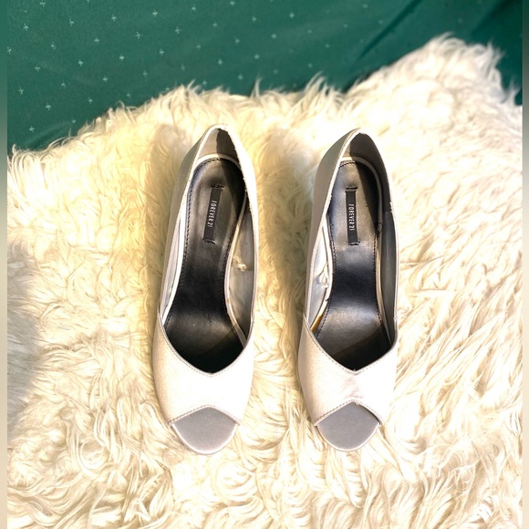 Forever 21 Shoes - Silver shoes Size 9.